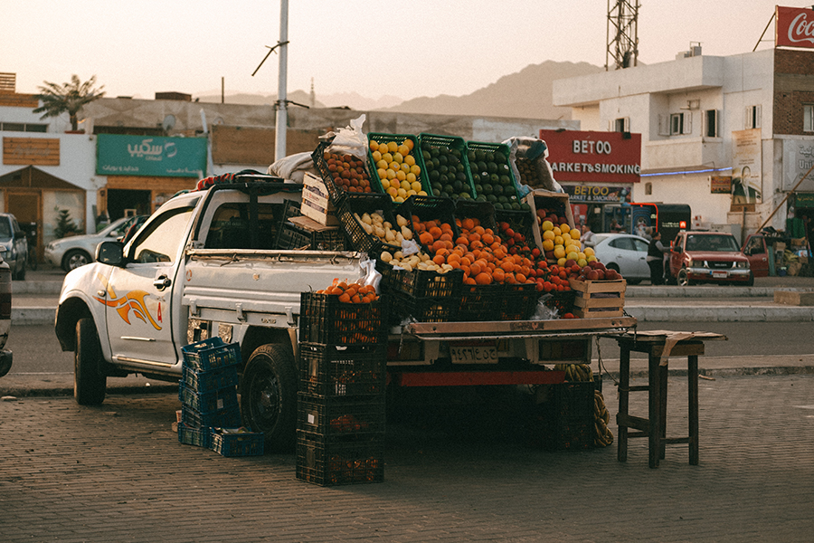 Truck loaded with fresh fruit at a street stall in Dahab